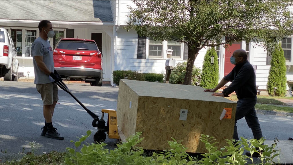 sculpture arrives in crate