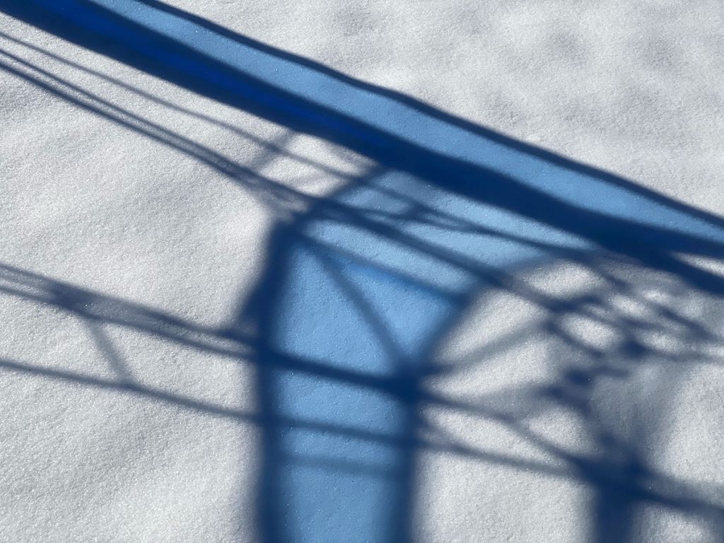 seraph sculpture and sun and snow